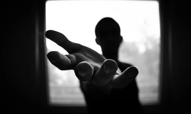 Man holding out his hand image